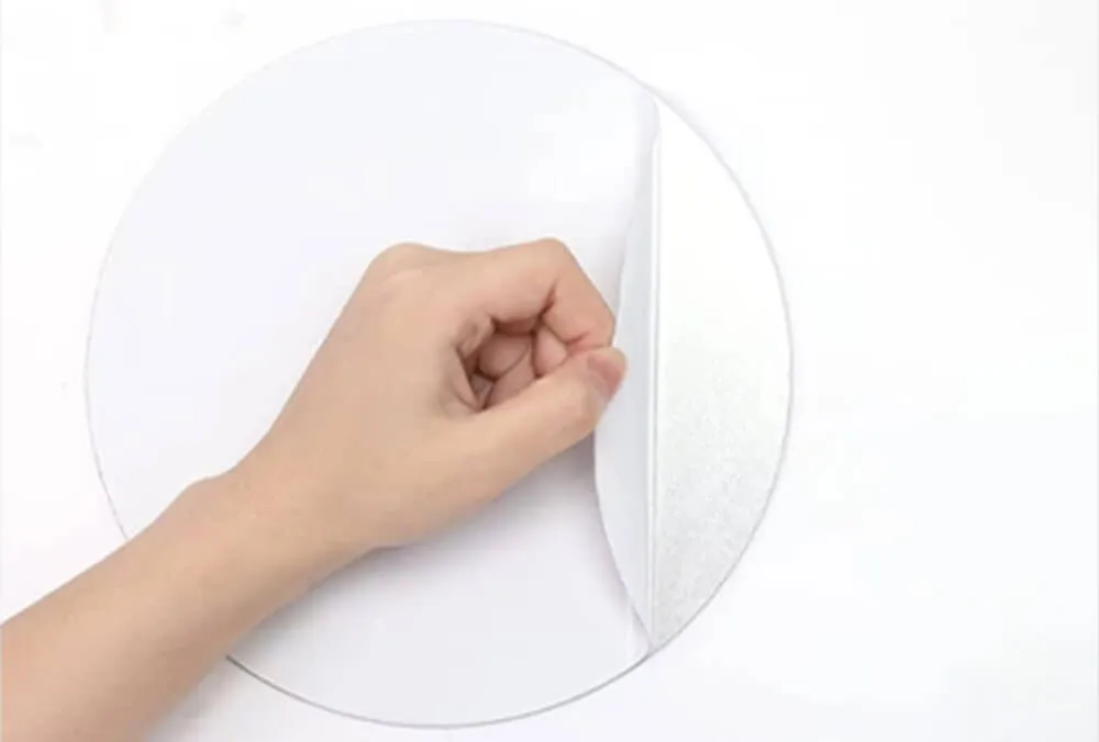 Acrylic Mirror Sticker Backing Film Removal Peeling off the backing film from an acrylic mirror sticker