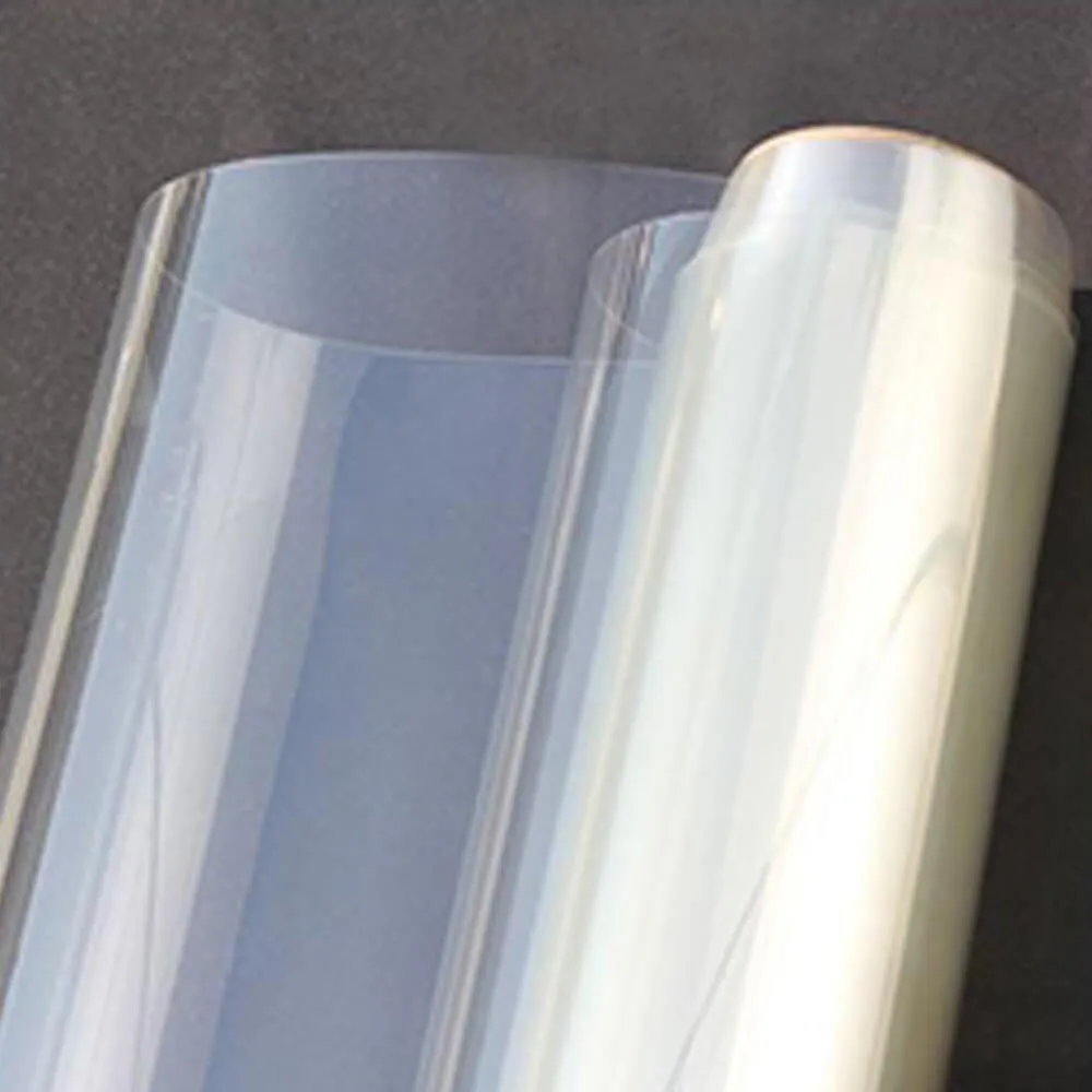 High-Adhesion PET Printing Film Roll High-adhesion PET printing film roll with clear transparent surface for industrial printing applications