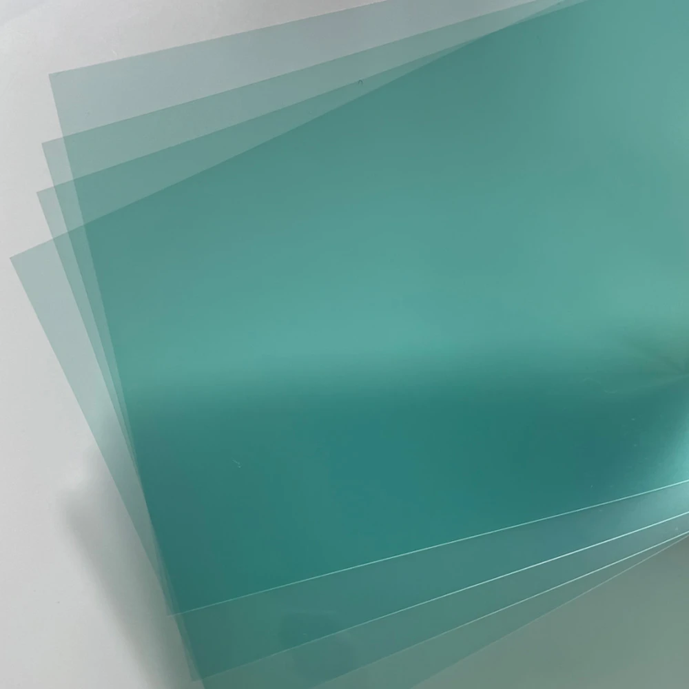 High-Adhesion PET Printing Film Sheet High-adhesion PET printing film sheet with transparent green-tinted surface for industrial printing applications